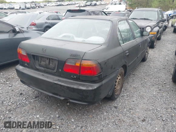 2000 Honda Civic LX with VIN 1HGEJ6674YL005143, listed as a IAAI auction lot 41961215 with 252,818 mi miles. Bid and sale history available at carsss.com. Image 4.