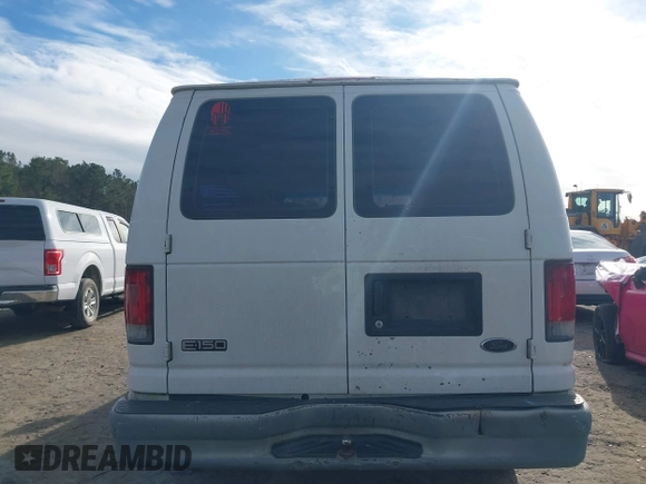 2002 Ford Econoline Cargo with VIN 1FTRE14252HB67887, listed as a IAAI auction lot 41180872 with 274,561 mi miles and . Bid and sale history available at carsss.com. Image 16.