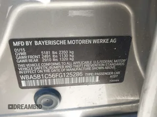2015 BMW 5 Series 535i with VIN WBA5B1C56FG125286, listed as a IAAI auction lot 41747088 with 136,970 mi miles and . Bid and sale history available at carsss.com. Image 9.