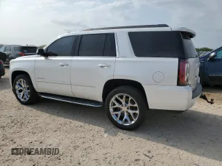 2016 GMC Yukon SLT with VIN 1GKS1BKC2GR248172, listed as a Copart auction lot 53146144 with 125,968 mi miles and Salvage Title. Bid and sale history available at carsss.com. Image 2.