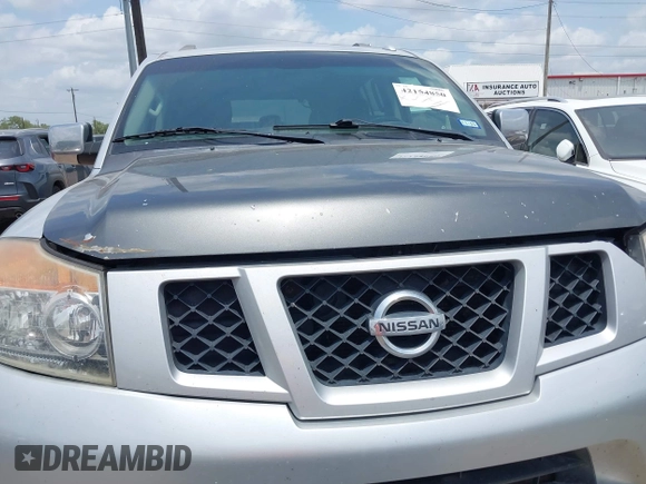 2014 Nissan Armada SV z VIN 5N1BA0ND7EN600201, wystawiony jako IAAI lot #42154850 z przebiegiem 290 225 mil mil oraz . Historia ofert i sprzedaży dostępna na DreamBid. Obrazek 12.