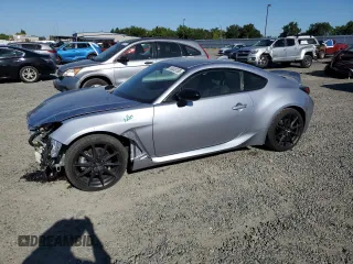 2023 Toyota 86 Premium z VIN JF1ZNBE17P9752912, wystawiony jako Copart lot #56538765 z przebiegiem 31 403 mil mil oraz Szkoda całkowita • Salvage title. Historia ofert i sprzedaży dostępna na DreamBid. Obrazek 1.