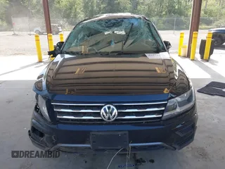 2021 Volkswagen Tiguan S with VIN 3VV0B7AX1MM098300, listed as a IAAI auction lot 42574636 with 53,559 mi miles and . Bid and sale history available at DreamBid. Image 12.