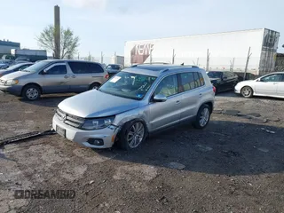 2013 Volkswagen Tiguan S with VIN WVGAV3AX0DW572915, listed as a IAAI auction lot 41937763 with 65,136 mi miles and . Bid and sale history available at DreamBid. Image 2.