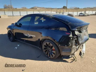 2022 Tesla Model Y Performance z VIN 7SAYGDEF3NF446769, wystawiony jako Copart lot #83702074 z przebiegiem 32 895 mil mil oraz Szkoda całkowita • Salvage title. Historia ofert i sprzedaży dostępna na DreamBid. Obrazek 2.