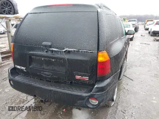 2005 GMC Envoy XL SLE with VIN 1GKET16S156160473, listed as a IAAI auction lot 41510661 with 233,942 mi miles. Bid and sale history available at carsss.com. Image 4.