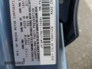 2014 Mazda 3 i Touring with VIN JM1BM1V78E1139884, listed as a Copart auction lot 61826395 with 76,411 mi miles and Salvage title. Bid and sale history available at DreamBid. Image 12.