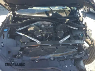 2020 BMW X5 M50i with VIN 5UXJU4C05LL228167, listed as a Copart auction lot 70390194 with Not Provided miles and Salvage Title. Bid and sale history available at DreamBid. Image 12.
