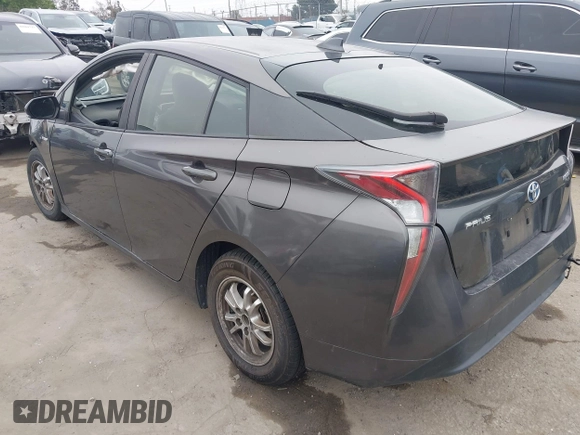 2016 Toyota Prius Two z VIN JTDKBRFU2G3508593, wystawiony jako IAAI lot #42248961 z przebiegiem 54 043 mil mil oraz . Historia ofert i sprzedaży dostępna na DreamBid. Obrazek 3.