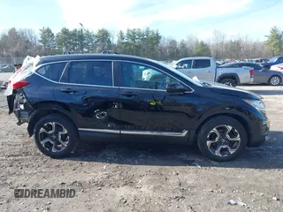 2019 Honda CR-V Touring with VIN 2HKRW2H95KH631787, listed as a IAAI auction lot 41844394 with 262,398 mi miles. Bid and sale history available at carsss.com. Image 13.