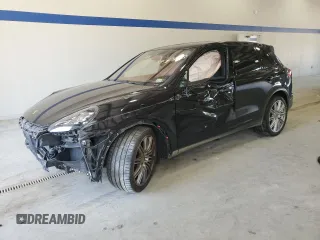 2016 Porsche Cayenne Turbo z VIN WP1AC2A27GLA88351, wystawiony jako Copart lot #55738385 z przebiegiem Nie podano mil oraz Szkoda całkowita • Salvage title. Historia ofert i sprzedaży dostępna na DreamBid. Obrazek 1.