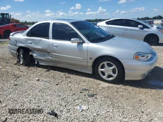 1998 Ford Contour с VIN 1FAFP68G1WK182658, выставлен на аукционе Copart как лот 74499894 с пробегом 76 717 миль миль и Списание • Salvage title. История ставок и продаж доступна на DreamBid. Изображение 4.