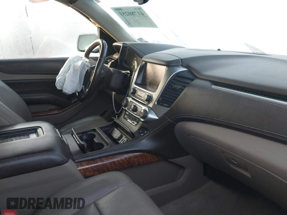 2016 Chevrolet Suburban LTZ with VIN 1GNSCJKC0GR173690, listed as a IAAI auction lot 41780251 with 125,603 mi miles and . Bid and sale history available at DreamBid. Image 5.