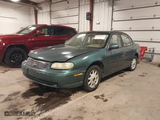 1998 Chevrolet Malibu LS with VIN 1G1NE52M6W6104642, listed as a IAAI auction lot 41636923 with 116,944 mi miles. Bid and sale history available at carsss.com. Image 2.