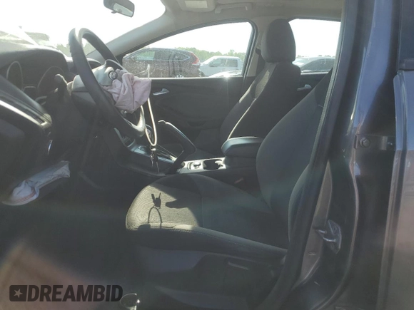 2014 Ford Focus SE z VIN 1FADP3K28EL104745, wystawiony jako Copart lot #54496215 z przebiegiem 154 565 mil mil oraz Szkoda całkowita • Salvage title. Historia ofert i sprzedaży dostępna na DreamBid. Obrazek 7.