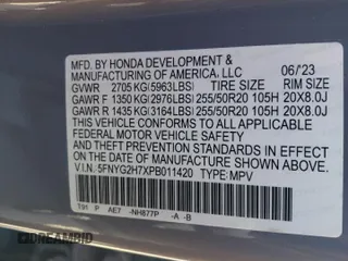 2023 Honda Pilot Touring with VIN 5FNYG2H7XPB011420, listed as a Copart auction lot 69799314 with 9,601 mi miles and Salvage Title. Bid and sale history available at carsss.com. Image 15.