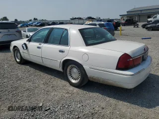 2002 Mercury Grand Marquis LS Premium z VIN 2MEFM75W52X666147, wystawiony jako Copart lot #58970815 z przebiegiem 133 495 mil mil oraz Szkoda całkowita • Salvage title. Historia ofert i sprzedaży dostępna na DreamBid. Obrazek 2.