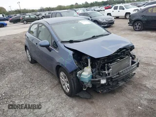2016 Kia Rio LX with VIN KNADM5A38G6638934, listed as a IAAI auction lot 41566769 with 76,355 mi miles. Bid and sale history available at carsss.com. Image 1.