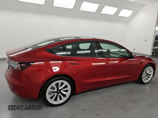 2022 Tesla Model 3 Long Range z VIN 5YJ3E1EBXNF291047, wystawiony jako Copart lot #59389825 z przebiegiem 103 980 mil mil oraz Czysty tytuł • Clean title. Historia ofert i sprzedaży dostępna na DreamBid. Obrazek 3.