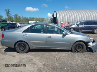 2006 Toyota Camry STD with VIN 4T1BE32KX6U647710, listed as a IAAI auction lot 42180551 with 163,906 mi miles and . Bid and sale history available at DreamBid. Image 14.