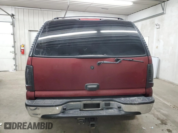 2002 Chevrolet Tahoe LS with VIN 1GNEC13T02R228644, listed as a Copart auction lot 55672545 with 245,005 mi miles and Non repairable. Bid and sale history available at DreamBid. Image 6.