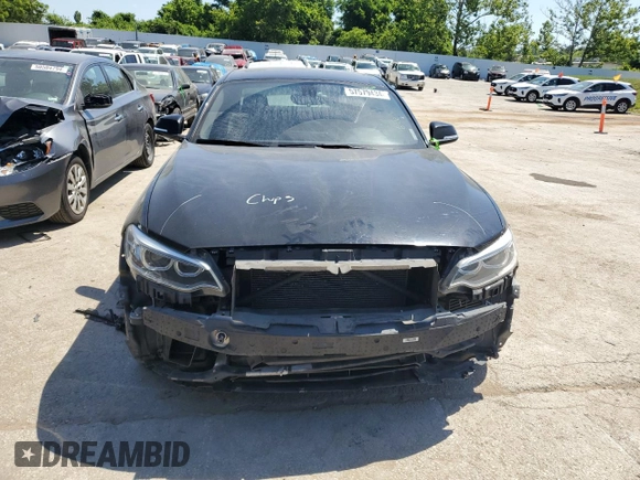 2014 BMW 2 Series 228i with VIN WBA1F5C58EV256093, listed as a Copart auction lot 57579434 with 74,596 mi miles and Salvage title. Bid and sale history available at DreamBid. Image 5.