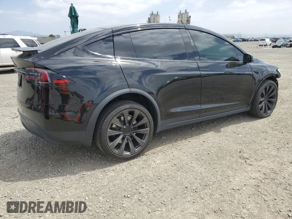 2022 Tesla Model X with VIN 7SAXCDE59NF360610, listed as a Copart auction lot 52575365 with 51,557 mi miles and Salvage Title. Bid and sale history available at carsss.com. Image 3.