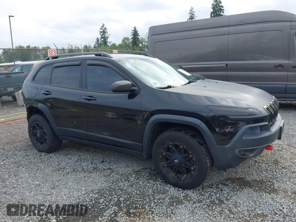 2014 Jeep Cherokee Trailhawk z VIN 1C4PJMBB1EW145683, wystawiony jako IAAI lot #42487730 z przebiegiem 148 277 mil mil oraz . Historia ofert i sprzedaży dostępna na DreamBid. Obrazek 14.