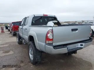 2011 Toyota Tacoma with VIN 3TMLU4ENXBM057058, listed as a IAAI auction lot 41088682 with 187,596 mi miles. Bid and sale history available at carsss.com. Image 3.
