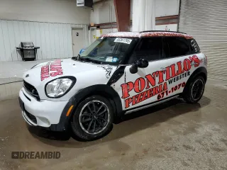 2015 MINI Countryman S with VIN WMWZC5C55FWP44389, listed as a Copart auction lot 65361795 with 28,990 mi miles and Salvage title. Bid and sale history available at DreamBid. Image 1.