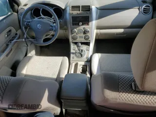 2009 Suzuki Grand Vitara z VIN JS3TD042294100363, wystawiony jako Copart lot #88151185 z przebiegiem 86 595 mil mil oraz Czysty tytuł • Clean title. Historia ofert i sprzedaży dostępna na DreamBid. Obrazek 8.
