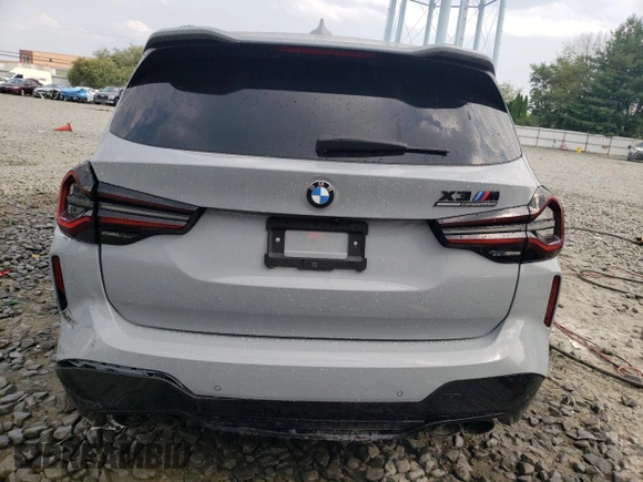 2022 BMW X3 M z VIN 5YM13EC0XN9J56822, wystawiony jako Copart lot #49873974 z przebiegiem 7396 mil mil oraz Szkoda całkowita • Salvage title. Historia ofert i sprzedaży dostępna na DreamBid. Obrazek 6.