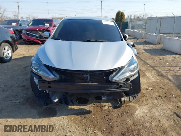 2018 Nissan Sentra S with VIN 3N1AB7AP1JY217456, listed as a IAAI auction lot 41647997 with 141,179 mi miles and . Bid and sale history available at DreamBid. Image 6.