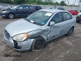 2008 Hyundai Accent GLS z VIN KMHCN46CX8U191823, wystawiony jako IAAI lot #42270245 z przebiegiem 242 852 mil mil oraz . Historia ofert i sprzedaży dostępna na DreamBid. Obrazek 2.
