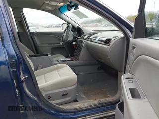 2007 Ford Five Hundred SEL with VIN 1FAHP24157G153400, listed as a IAAI auction lot 41496444 with 215,285 mi miles. Bid and sale history available at carsss.com. Image 5.
