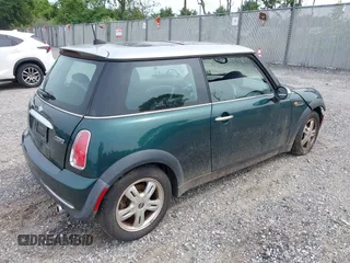 2006 MINI Hardtop with VIN WMWRC33566TK64108, listed as a IAAI auction lot 42353050 with 95,223 mi miles and . Bid and sale history available at DreamBid. Image 4.