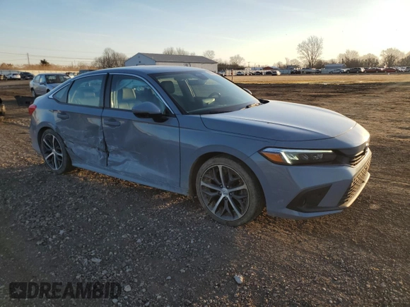 2022 Honda Civic Touring z VIN 2HGFE1F90NH324934, wystawiony jako Copart lot #48501555 z przebiegiem 99 825 mil mil oraz Szkoda całkowita • Salvage title. Historia ofert i sprzedaży dostępna na DreamBid. Obrazek 4.