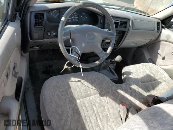 2003 Toyota Tacoma z VIN 5TENL42N73Z299388, wystawiony jako Copart lot #54872325 z przebiegiem 159 153 mil mil oraz Szkoda całkowita • Salvage title. Historia ofert i sprzedaży dostępna na DreamBid. Obrazek 8.