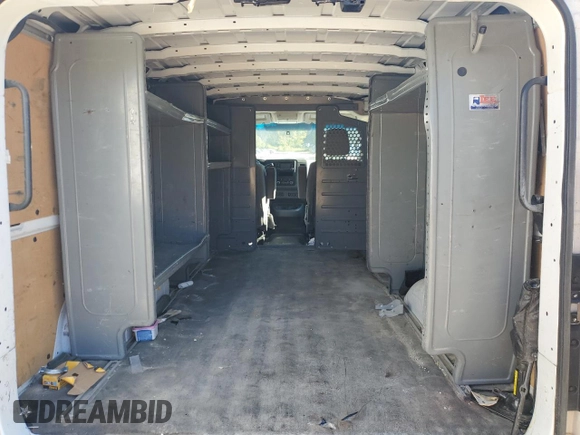 2018 Nissan NV Cargo S z VIN 1N6BF0KM4JN809929, wystawiony jako Copart lot #70578344 z przebiegiem 141 309 mil mil oraz Szkoda całkowita • Salvage title. Historia ofert i sprzedaży dostępna na DreamBid. Obrazek 10.