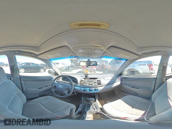 2003 Toyota Camry LE z VIN 4T1BF32K93U566965, wystawiony jako Copart lot #71979144 z przebiegiem 267 228 mil mil oraz Szkoda całkowita • Salvage title. Historia ofert i sprzedaży dostępna na DreamBid. Obrazek 13.