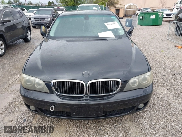 2007 BMW 7 Series 750Li with VIN WBAHN83577DT77290, listed as a IAAI auction lot 41908957 with 164,215 mi miles. Bid and sale history available at carsss.com. Image 6.