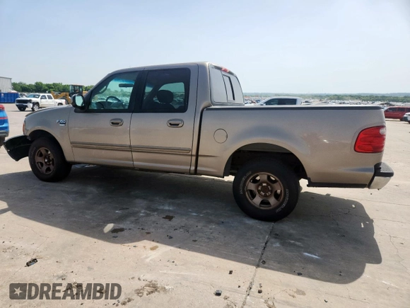 2001 Ford F-150 XLT z VIN 1FTRW07L01KB30498, wystawiony jako Copart lot #57157585 z przebiegiem 343 041 mil mil oraz Szkoda całkowita • Salvage title. Historia ofert i sprzedaży dostępna na DreamBid. Obrazek 2.