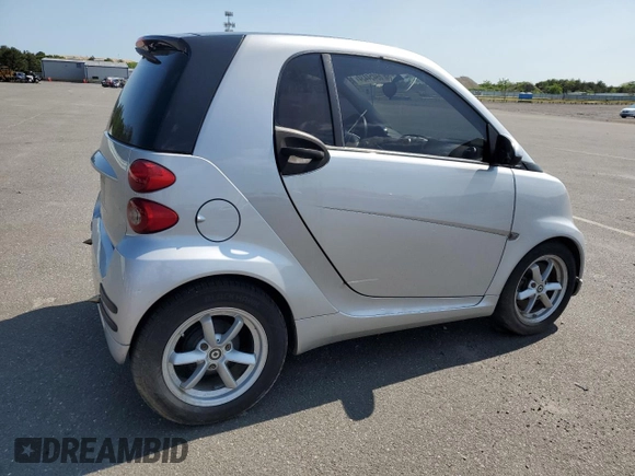 2011 Smart fortwo Pure with VIN WMEEJ3BA6BK449704, listed as a Copart auction lot 69454434 with 23,581 mi miles and Clean title. Bid and sale history available at DreamBid. Image 3.