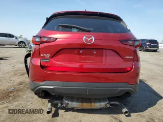 2023 Mazda CX-5 S Select with VIN JM3KFBBM2P0242664, listed as a Copart auction lot 55022895 with 14,129 mi miles and Salvage Title. Bid and sale history available at DreamBid. Image 6.