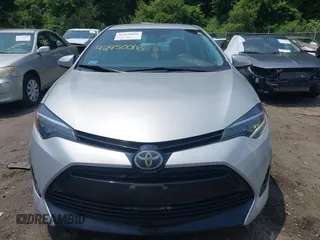 2018 Toyota Corolla L with VIN 2T1BURHE8JC116054, listed as a IAAI auction lot 42450016 with 65,342 mi miles and . Bid and sale history available at DreamBid. Image 12.