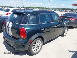 2011 MINI Countryman S with VIN WMWZC5C53BWM10484, listed as a IAAI auction lot 42250690 with 113,534 mi miles and . Bid and sale history available at DreamBid. Image 4.