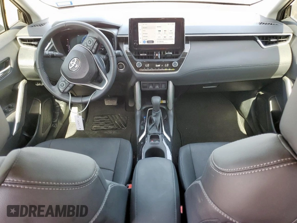 2023 Toyota Corolla Cross XLE with VIN 7MUDAAAG2PV072301, listed as a Copart auction lot 61547155 with 25,017 mi miles and Salvage title. Bid and sale history available at DreamBid. Image 8.