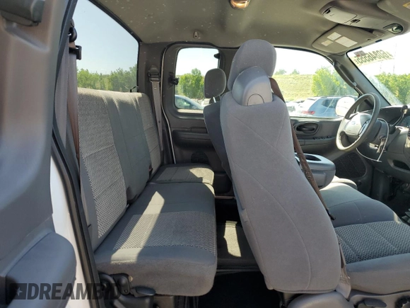 2003 Ford F-150 XL with VIN 1FTRX18L63NA76059, listed as a Copart auction lot 60846555 with 57,346 mi miles and Salvage title. Bid and sale history available at DreamBid. Image 10.