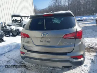 2017 Hyundai Santa Fe 2.4L with VIN 5NMZUDLB4HH034437, listed as a IAAI auction lot 41565545 with 96,640 mi miles and . Bid and sale history available at DreamBid. Image 16.