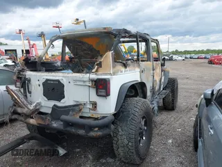 2012 Jeep Wrangler Unlimited Sahara with VIN 1C4BJWEG0CL167797, listed as a IAAI auction lot 42331710 with Not provided miles and . Bid and sale history available at DreamBid. Image 4.